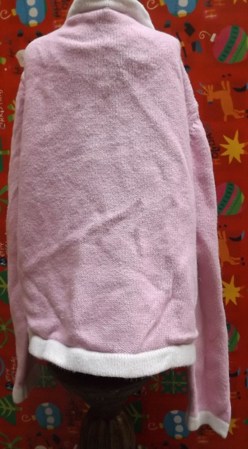 ugly pink sweater