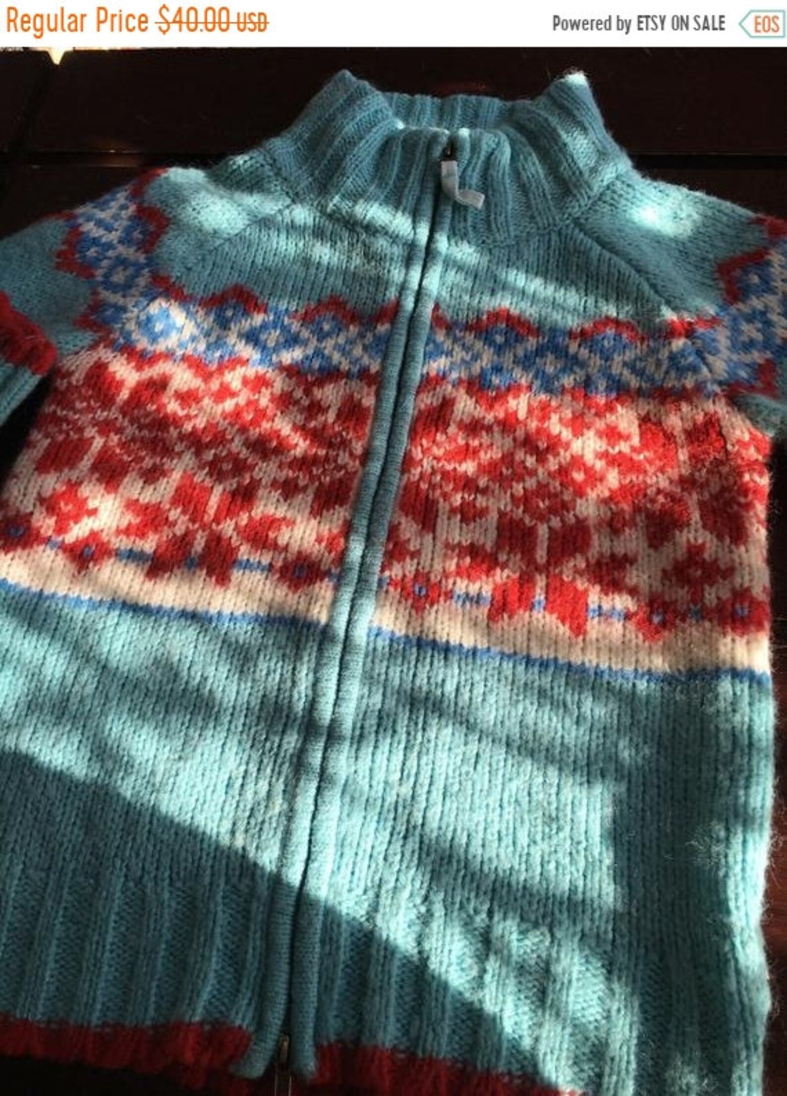 red and blue christmas sweater
