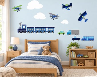 May include: A set of wall decals featuring a blue train, various airplanes, clouds, a green car, a blue truck, and a blue bus. The decals are arranged on a light blue wall above a wooden bed frame with blue and white striped bedding.