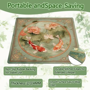 May include: A rectangular desk mat featuring a circular illustration of two koi fish swimming among pink lotus flowers and green lily pads on a sage green background. The mat has gold decorative corner accents, stitched edges, and a rubber backing.