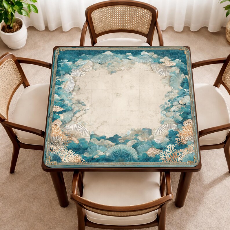 May include: A square wooden table with a decorative top featuring a blue and white ocean-themed design. The table is surrounded by four wooden chairs with woven backs and white cushions. The table's top has a detailed pattern of stylized waves, shells, and coral.