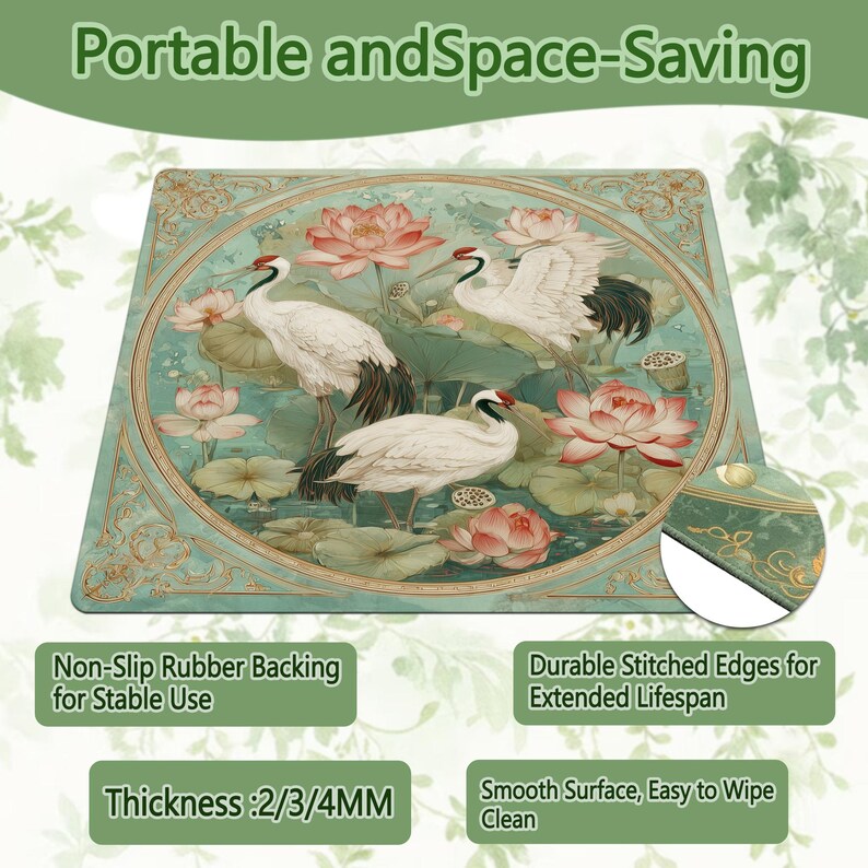 May include: A rectangular desk mat featuring a circular illustration of three white cranes among pink lotus flowers and green lily pads. The text reads Portable and Space-Saving, Non-Slip Rubber Backing for Stable Use, Durable Stitched Edges, and Thickness: 2/3/4MM.