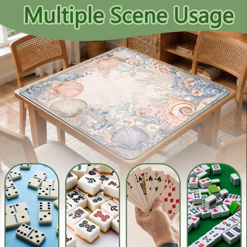 May include: A square table mat featuring a light-colored surface with a detailed seashell and coral pattern in soft blue, pink, and beige tones. The mat is displayed on a wooden table, with smaller circular insets showing dominoes, mahjong tiles, and playing cards.