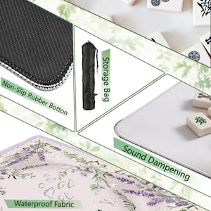 May include: A lavender-themed Mahjong mat with a floral design, featuring a non-slip rubber bottom, waterproof fabric, and sound dampening. Includes a storage bag. The image also shows Mahjong tiles.