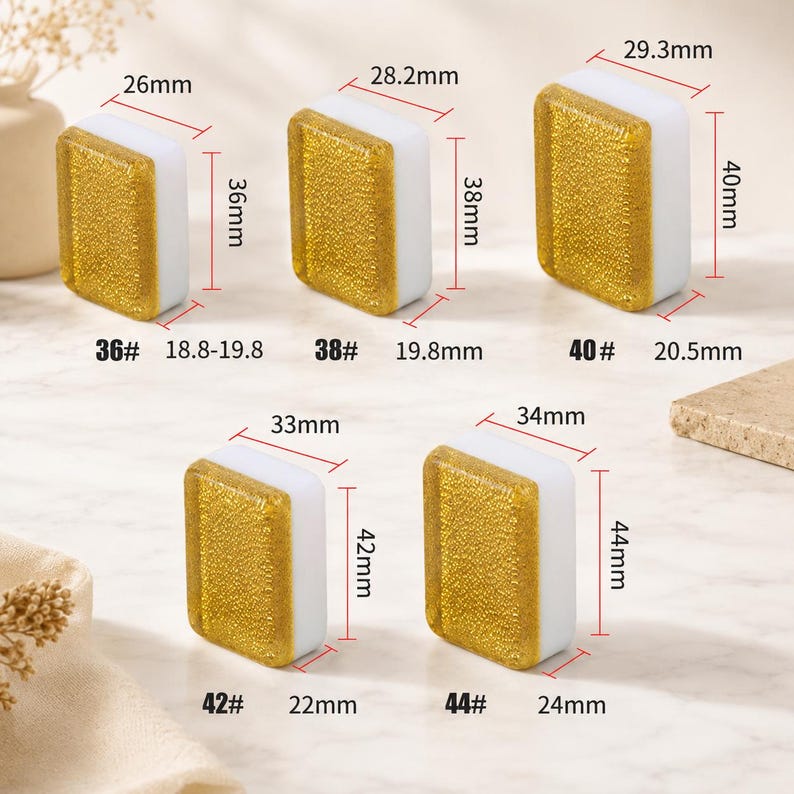 May include: A collection of rectangular, two-tone objects with gold glitter and white sides. Measurements in millimeters are displayed, with sizes ranging from 26mm to 34mm wide and 36mm to 44mm tall. The objects are labeled with numbers.