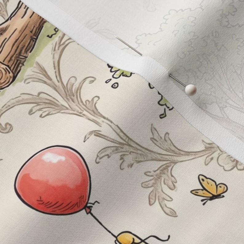 May include: Close-up of a fabric with a whimsical illustration. A red balloon is held by a character, with a yellow butterfly nearby. The fabric has a cream background with a decorative floral pattern and a white seam.