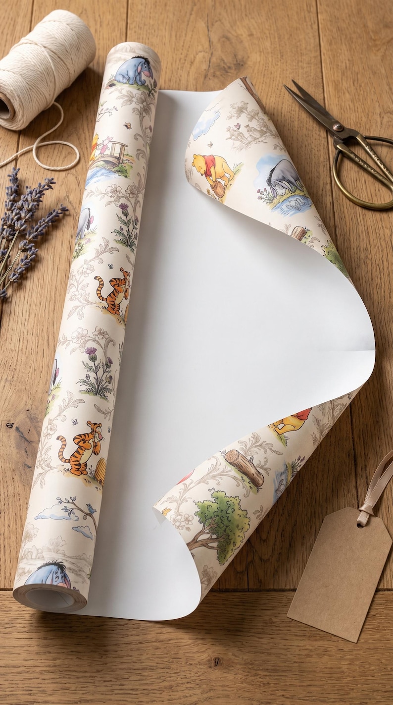 May include: A roll of cream-colored wrapping paper featuring a repeating pattern of Winnie the Pooh characters including Pooh, Tigger, and Eeyore, interspersed with floral and woodland illustrations. The paper has a smooth, matte finish.