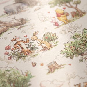 May include: A cream-colored fabric featuring a repeating pattern of Winnie the Pooh characters including Tigger, Piglet, and Rabbit. The illustrations are rendered in a soft, watercolor style with green trees, small red hearts, and brown tree stumps.