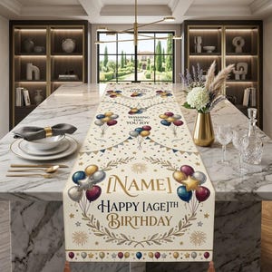 May include: A cream-colored table runner featuring a repeating pattern of colorful balloons, stars, and fireworks. The text reads "TIME TO CELEBRATE", "WISHING YOU YOU JOY", "[NAME]", and "HAPPY [AGE]TH BIRTHDAY" in elegant gold and black lettering.