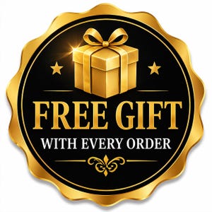 May include: A circular gold and black emblem featuring a gold gift box with a bow at the top, two small gold stars, and the text "FREE GIFT" in large gold letters followed by "WITH EVERY ORDER" in smaller white letters, with a decorative gold flourish.