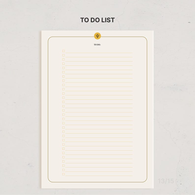 May include: A rectangular to-do list notepad with a cream-colored background and a thin gold border. The top center features a small gold circle with a Greek psi symbol. Below this, the text TO DO: sits above twenty-two horizontal lines.