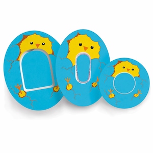 May include: Three blue, egg-shaped stickers with a yellow chick hatching from each. The chicks have orange beaks and black eyes. The eggs have brown cracks and small yellow feet. The stickers are of varying sizes.