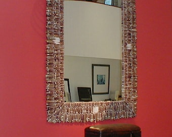 Thousands of Sea Urchin Spines on a square Mirror