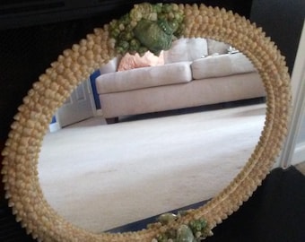 Green Turbo Sea Shells highlight a White  Oval Mirror