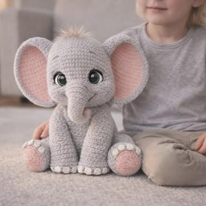 May include: A white ceramic mug with a black handle and the text "But First, Coffee" in a black, handwritten-style font. The mug is on a white surface.