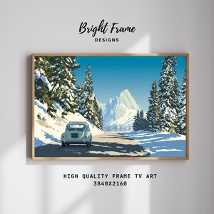 May include: A framed digital art print featuring a light blue vintage car driving on a snowy road through a forest of snow-covered pine trees toward jagged, snow-capped mountains under a clear blue sky. Text reads Bright Frame DESIGNS 3840X2160.