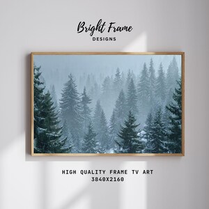 May include: A framed print depicting a misty forest with tall evergreen trees. The artwork is set in a light brown wooden frame. The text "Bright Frame Designs" is at the top, and "HIGH QUALITY FRAME TV ART 3840x2160" is at the bottom.