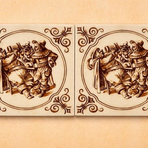 May include: A set of three ceramic nesting bowls in shades of blue, green, and white. The bowls have a speckled glaze and a simple, modern design. The largest bowl is about 15 cm in diameter.