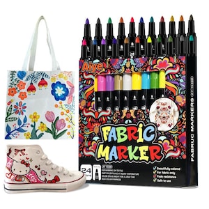 May include: A set of 24 fabric markers with a variety of colors, a white tote bag with floral designs, and a white high-top sneaker with a cartoon character design. The fabric markers are in a colorful box with the text "FABRIC MARKER".
