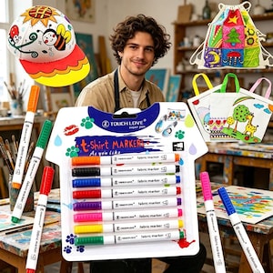 May include: A set of Touch Love t-shirt markers in a t-shirt shaped package, featuring eight fabric markers in orange, black, blue, red, purple, pink, yellow, and green, alongside a decorated baseball cap and three small fabric bags.