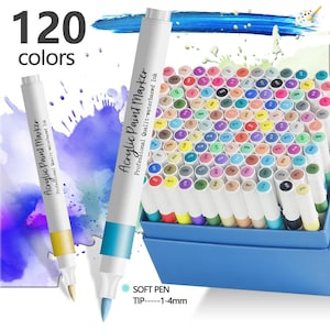 May include: A set of 120 acrylic paint markers with professional water-based ink. The markers feature white barrels with colored caps and tips, and are stored in a blue box. The text on the markers reads Acrylic Paint Marker Professional Quality-waterbased Ink.