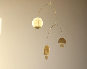 Rook kinetic handmade modern stylish interior mobile in brass