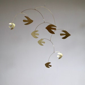 Flutter kinetic handmade modern stylish interior mobile in brass