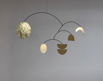 Modern kinetic brass mobile for modern interior