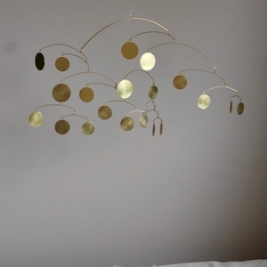 Kinetic mobile Art sculpture in brass for modern interior