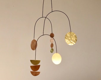 Modern kinetic brass and bronze mobile for modern interior