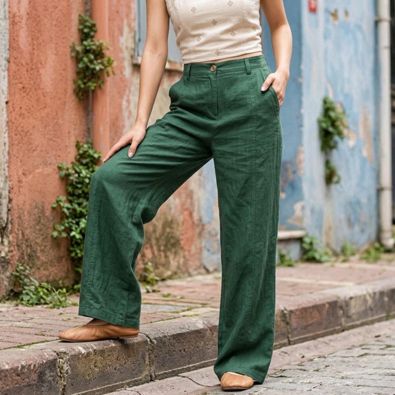 Relaxed wide leg Tencel pants for women in green with high rise fit styled casually outdoors