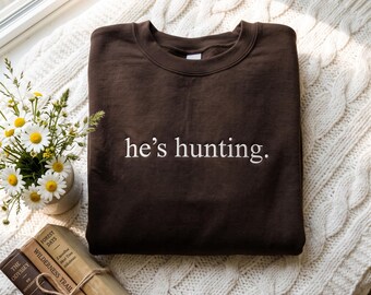 Embroidered He's Hunting Sweatshirt: Deer Hunting Season Gift for Mom (65% Cotton)