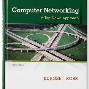 May include: A hardcover textbook titled Computer Networking: A Top-Down Approach, sixth edition, by Kurose and Ross. The dark green cover features a white title and a large aerial photograph of a complex highway interchange with concrete roads.