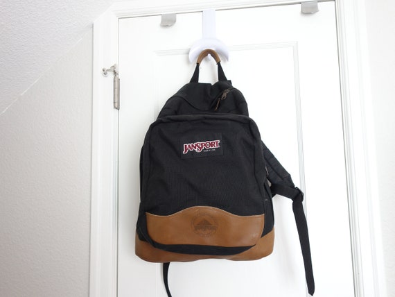 classic jansport backpack with leather bottom