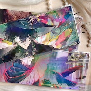 May include: A rectangular collectible card featuring anime-style illustrations of Klein Moretti. The artwork displays a character in a wide-brimmed hat and monocle, alongside a dark bird in flight, with vibrant, abstract watercolor-like color splashes.