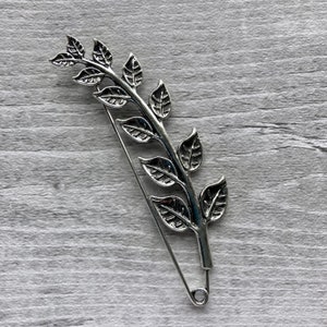 Brooch silver tone choose design leaves, birds, arrow, and flower image 3