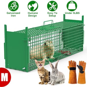 May include: A green metal animal trap with a wire mesh design. The trap features a handle and is labeled "Galvanized Iron", "Humane Design", "Easy To Setup", and "Under 5LBS". A cat, rabbit, and gloves are also shown.