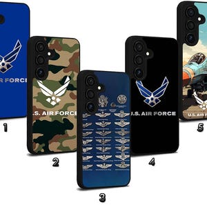 May include: A collection of five phone cases featuring U.S. Air Force designs. The cases display the Air Force logo, camouflage patterns, and illustrations of aircraft. The cases are in various colors, including blue, black, and a camouflage pattern.