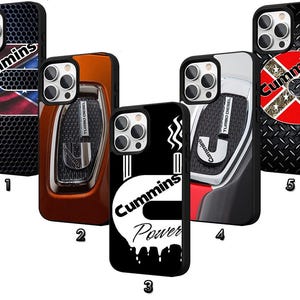 May include: A collection of phone cases featuring the "Cummins" logo and design elements. The cases display various backgrounds, including a black and red flag, a metallic grill, and a key-like design. The cases are black and have a glossy finish.