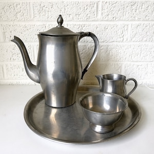 Vintage International Pewter Coffee or Tea Set | Colonial 276 Series Curved Handle, Hinged Lid, Matching Creamer, Sugar Bowl, and Tray 1970s