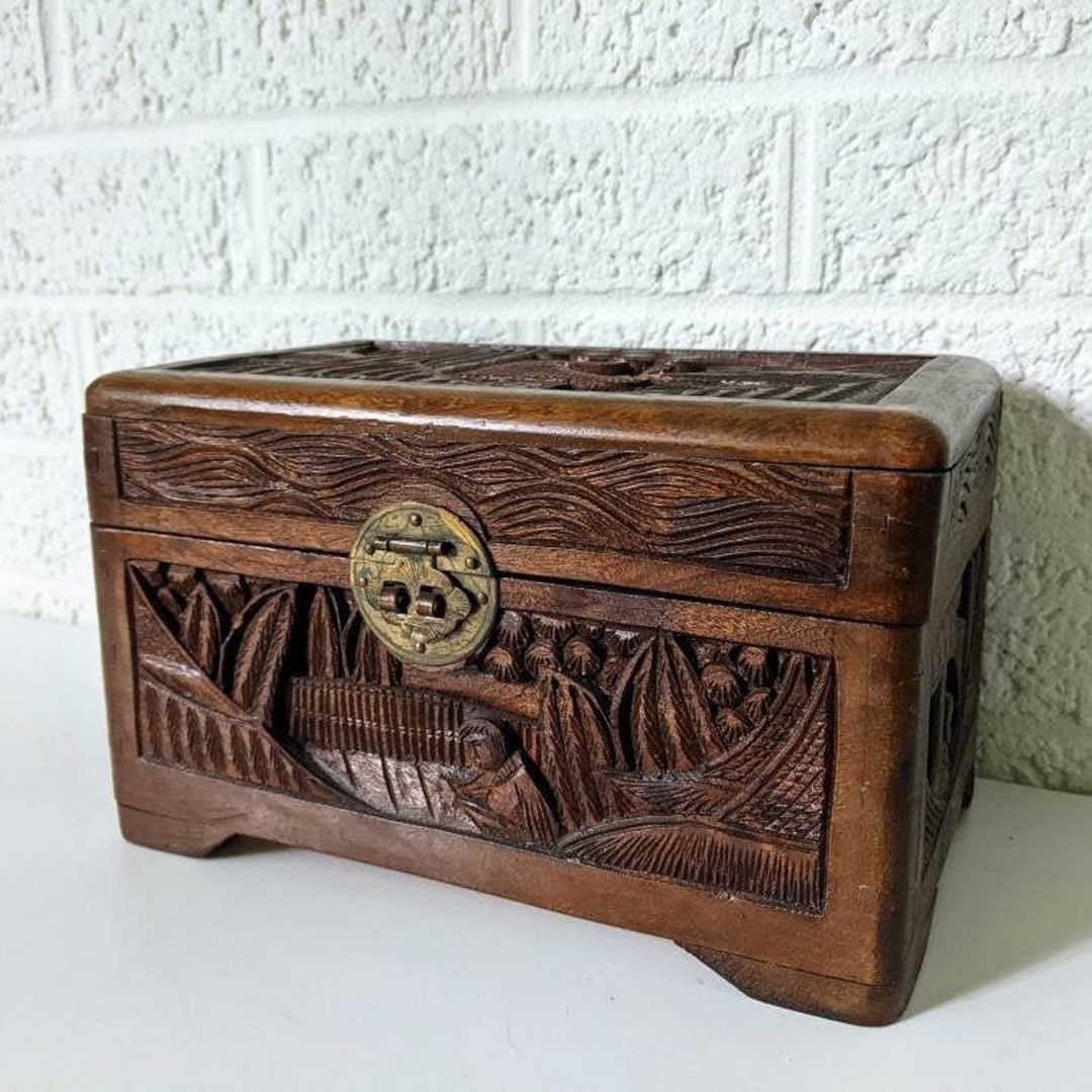 Hand carved wooden chest discount