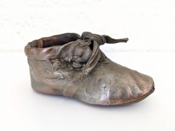 copper plated baby shoes