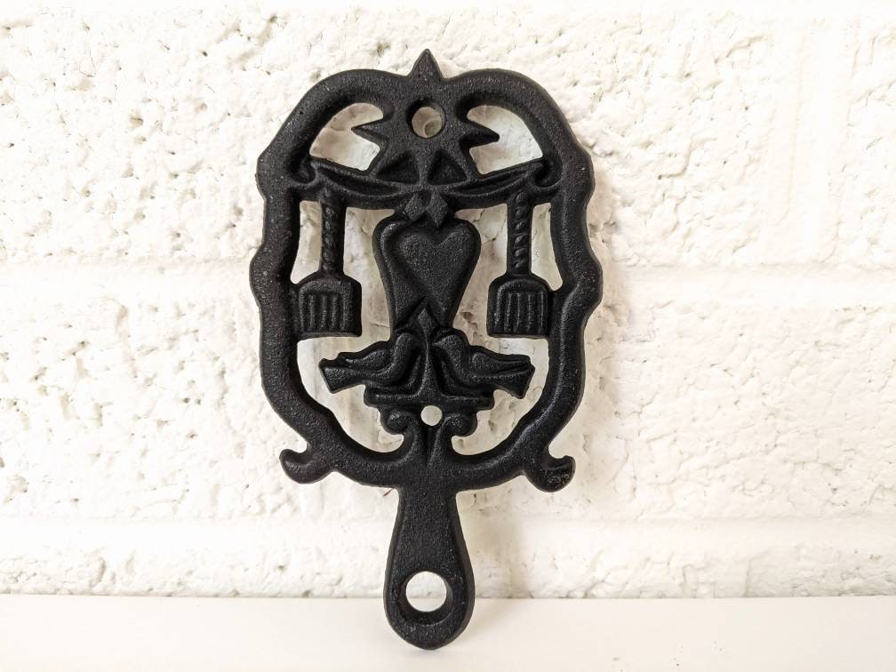 Vintage JZH 1951 Cast Iron Trivet or Wall Art | J. Z. H. Trivet | Birds, Hearts, Brooms, Star