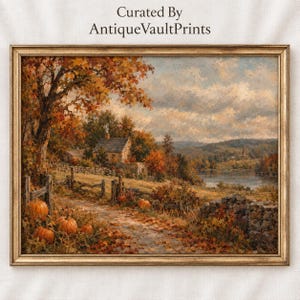 May include: A framed landscape painting titled Curated By AntiqueVaultPrints depicting an autumn scene with orange pumpkins in the foreground, a stone fence, a rustic house, and trees with fall foliage overlooking a lake under a cloudy sky.