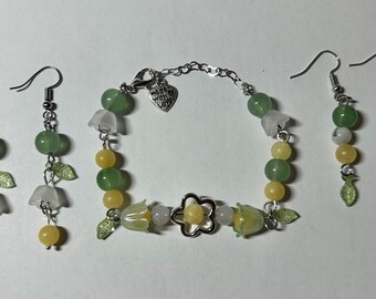 Set met Sunlit Sprout-armbanden en -oorbellen