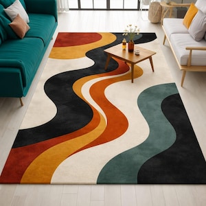 May include: A large rug with a retro design. The rug has a cream background with wavy stripes in black, orange, rust, yellow, and teal. The rug is in a living room setting, with a wooden coffee table.