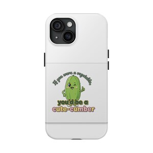 May include: White phone case with a graphic of a smiling cartoon cucumber giving a thumbs up. The text on the case reads "If you were a vegetable, you'd be a cute-cumber."