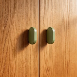 柔らかなパステルカラーのミニマルな引き出しノブ、ユニークな小型引き出し取っ手