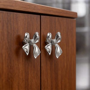 Tirador de armario de latón con diseño de lazo, tirador de cajón de lujo en plata y oro.