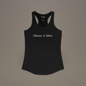 May include: Black racerback tank top with the text "Ravaen & Bone" in white script. The tank top has a scoop neck and a racerback design. The top is made of a soft material.